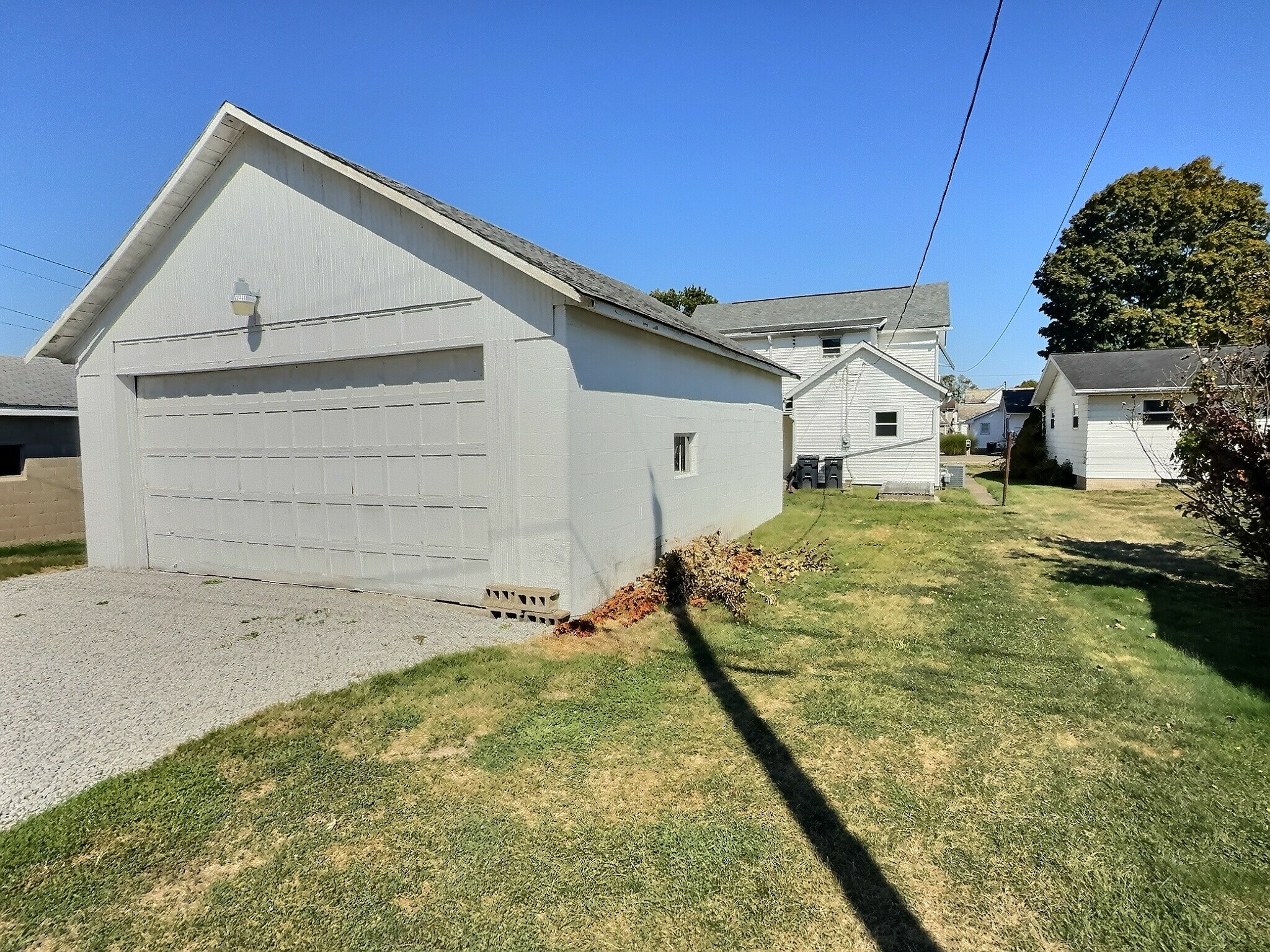 Backyard view with detached garage